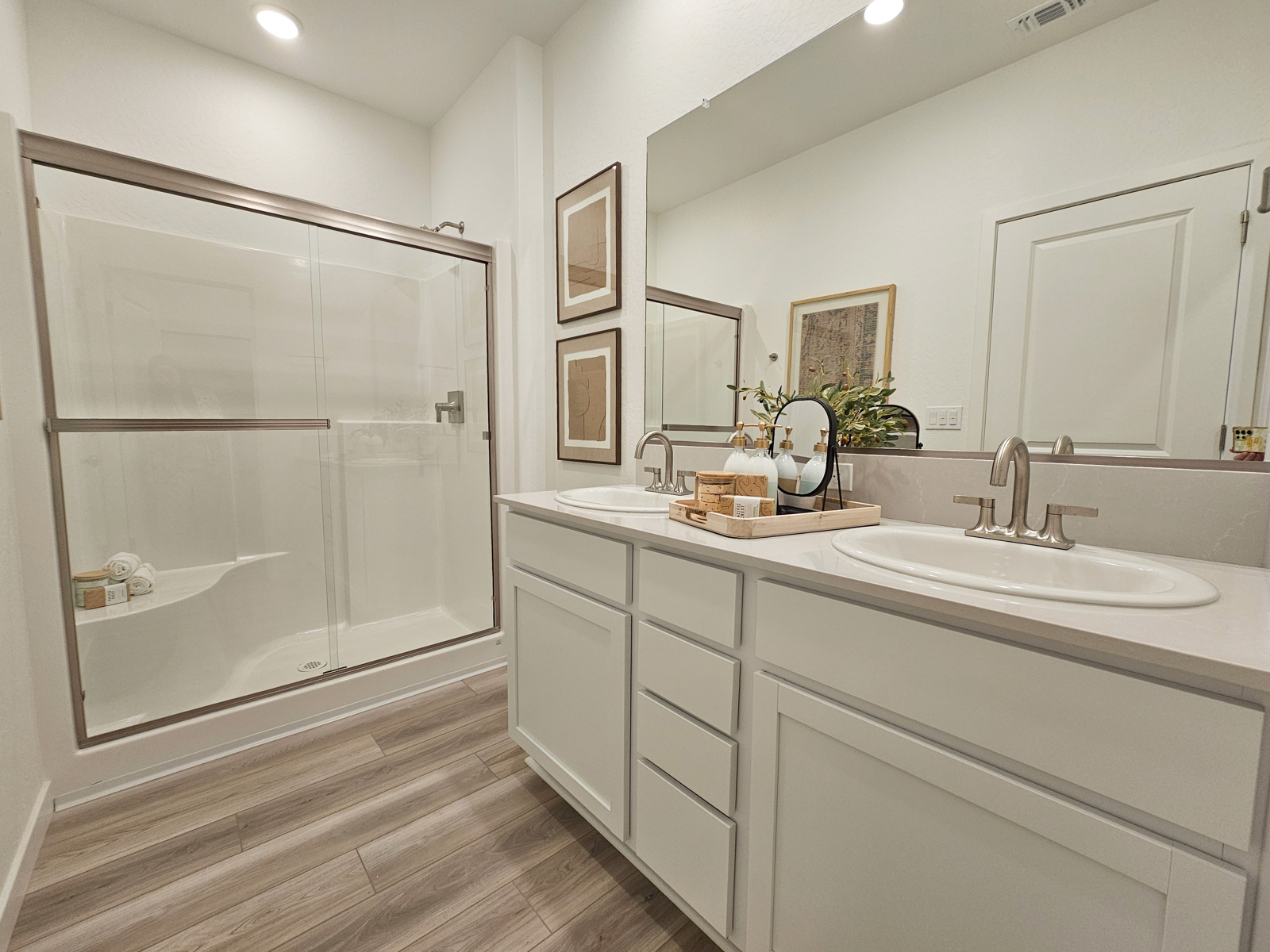 A bathroom with a glass shower.