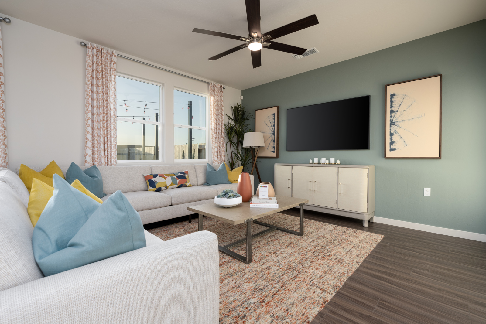 A living room with a tv and couches.