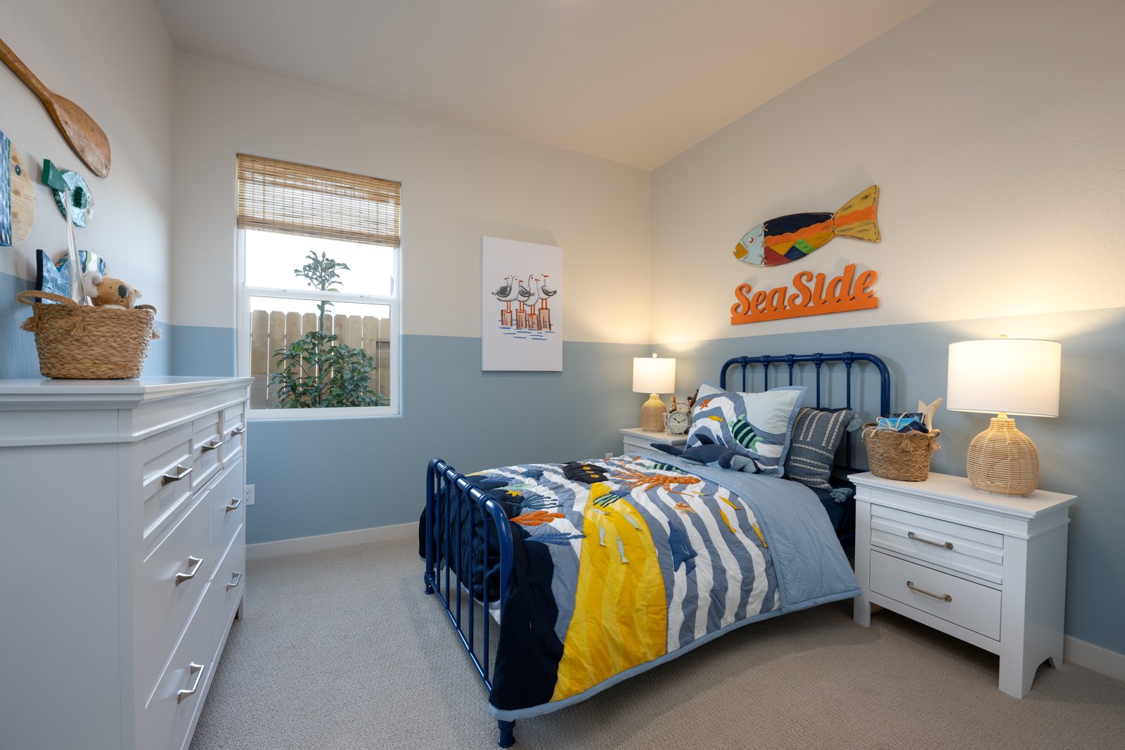 A bedroom with a bed and a window.