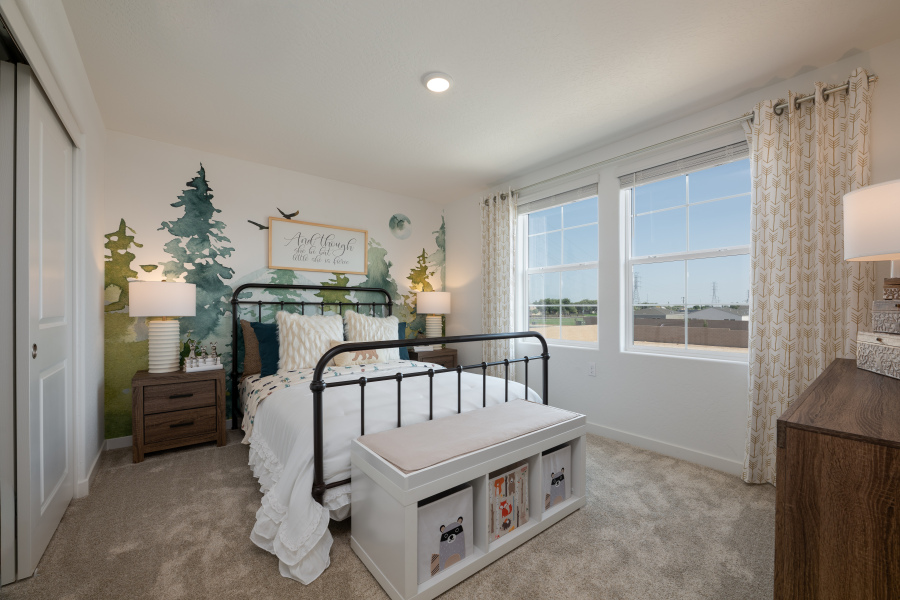 A room with a bed and a window.