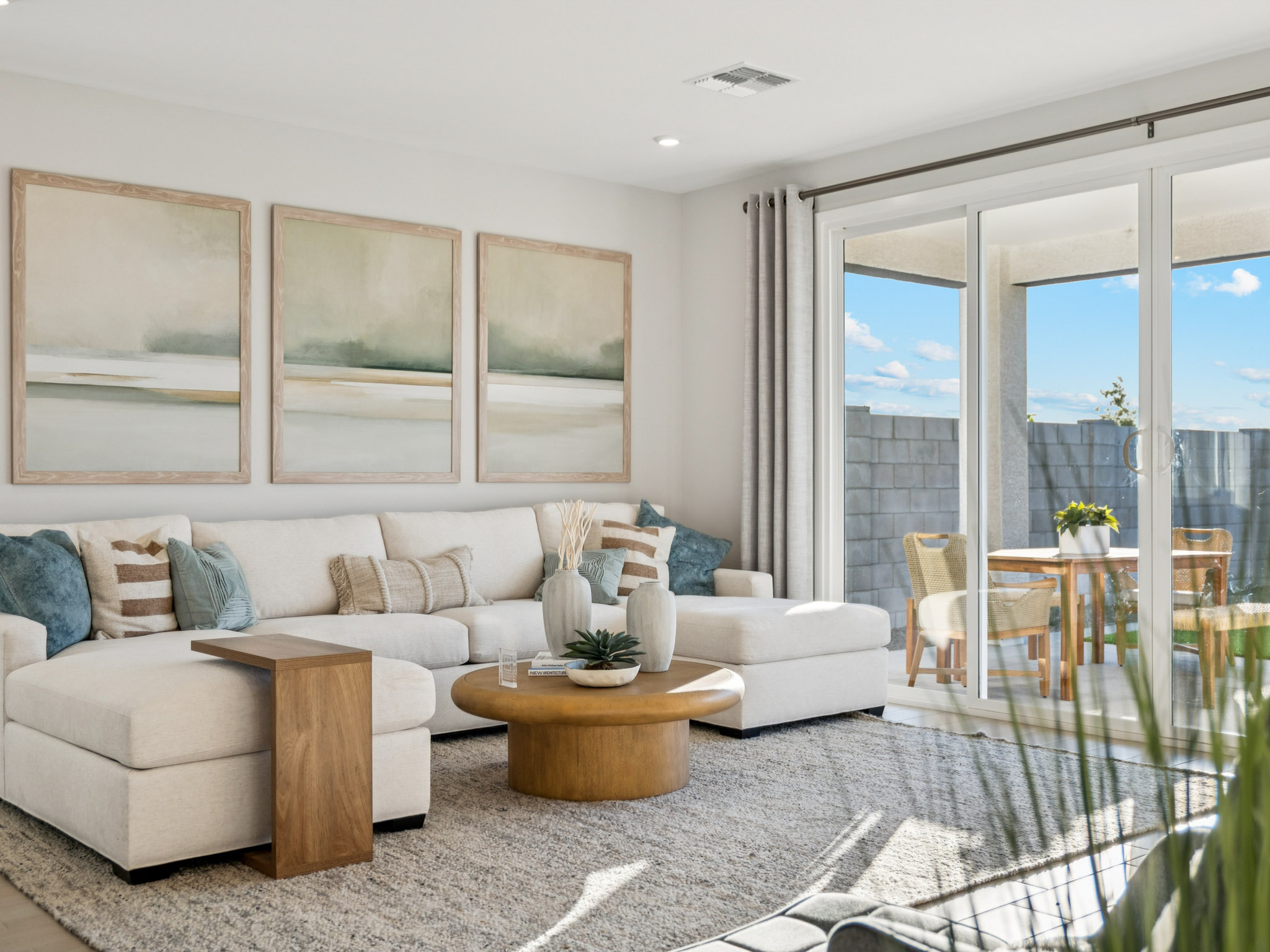 A living room with a large window.
