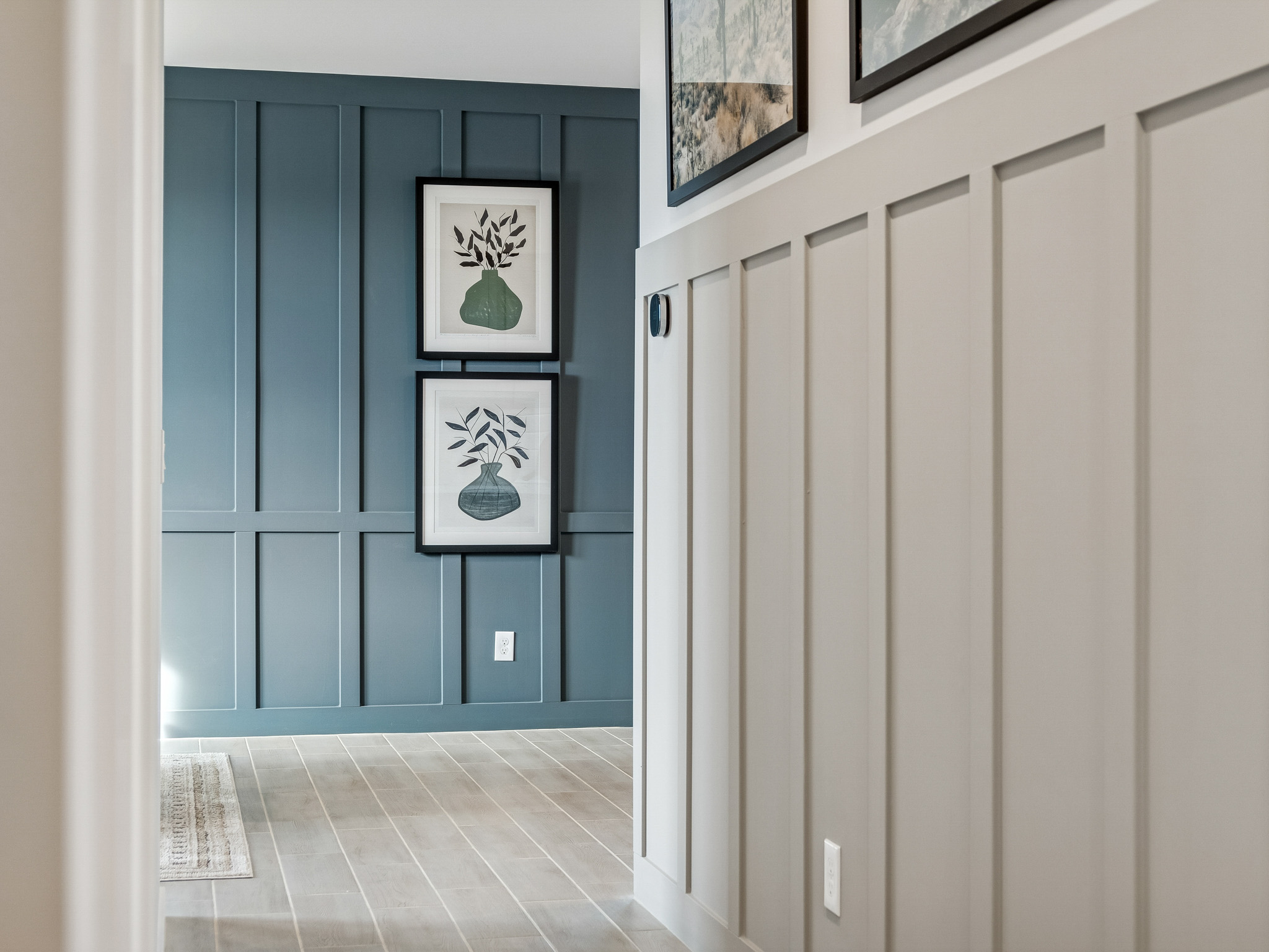 A hallway with white doors.