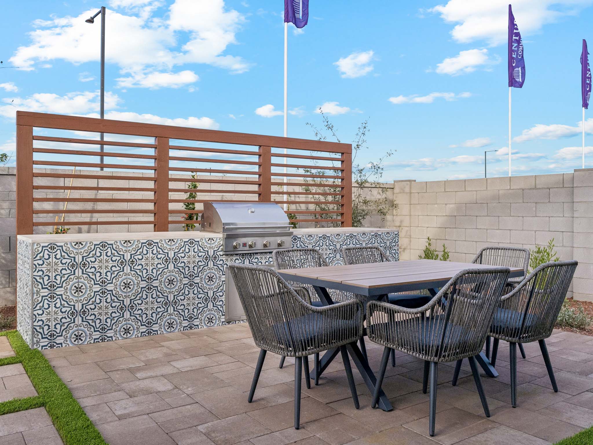 A table and chairs outside.