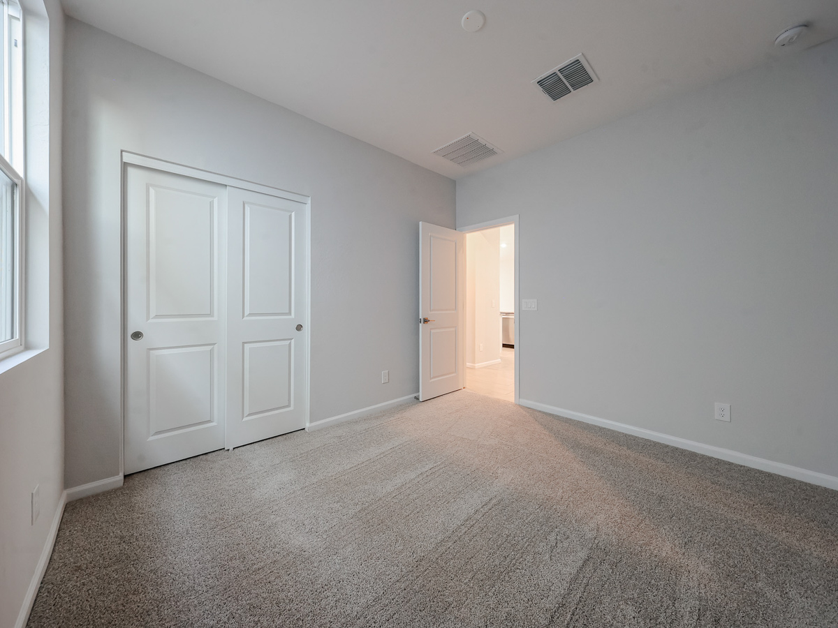 A room with white doors.