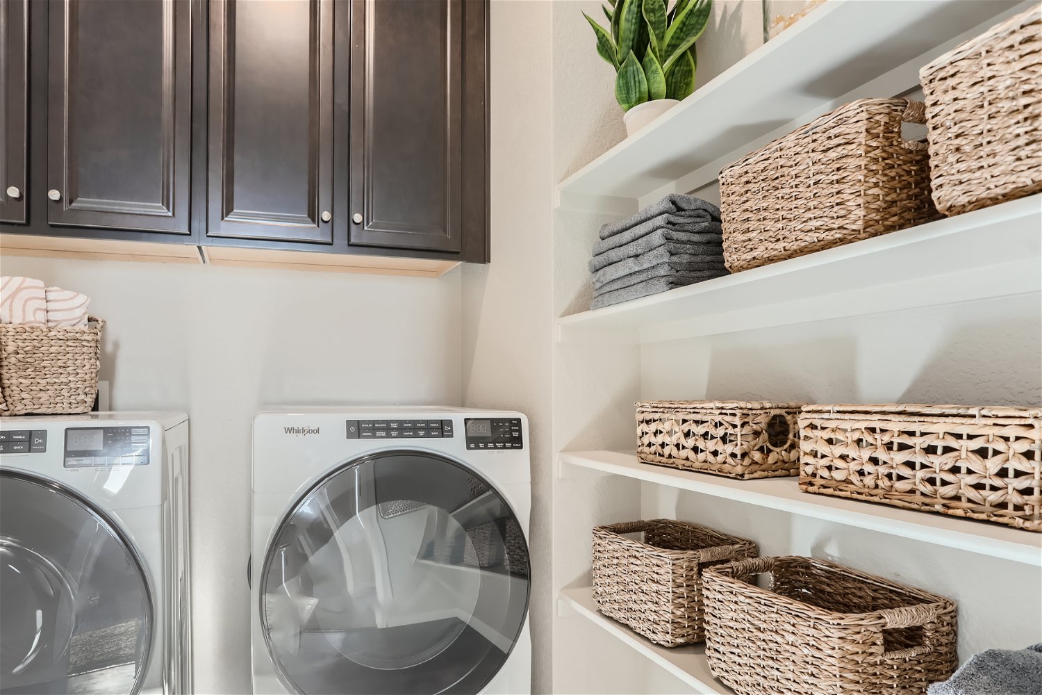 A laundry room with baskets and baskets.
