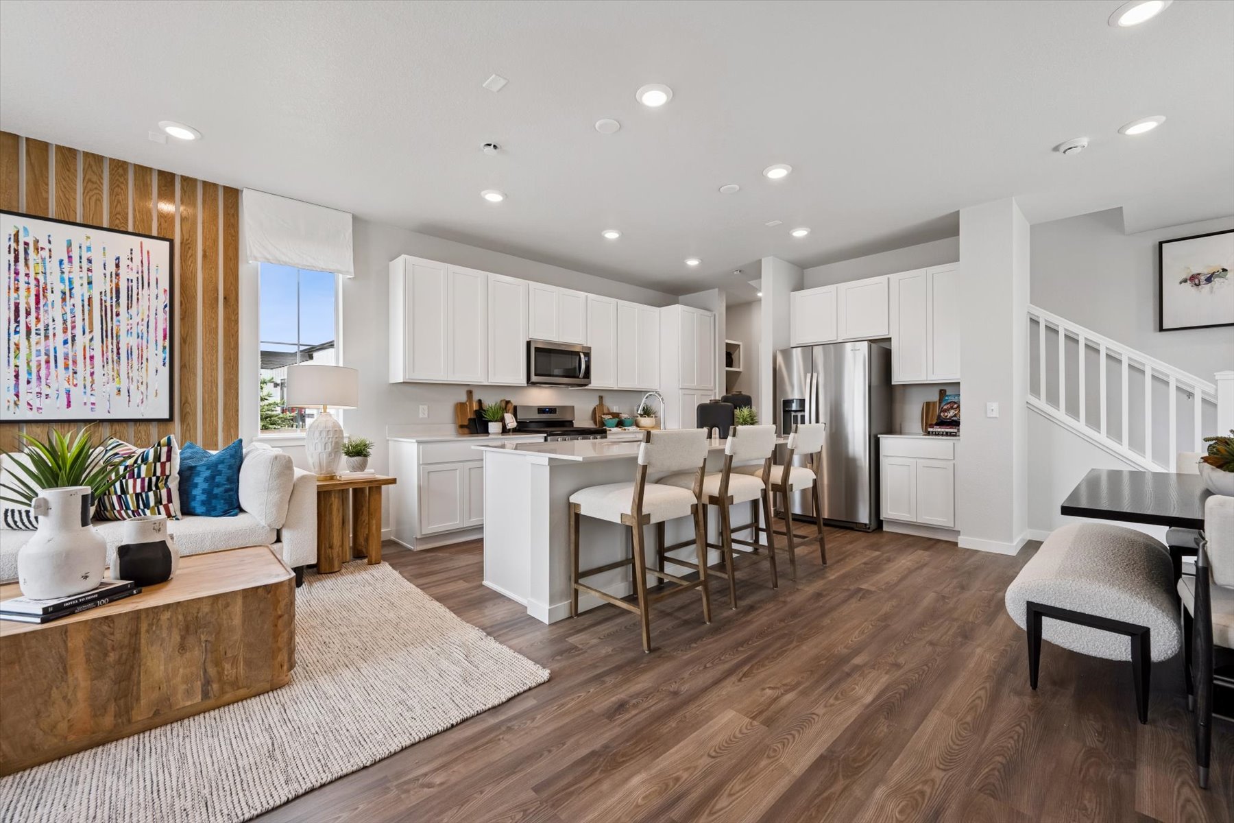 A large kitchen with white cabinets.