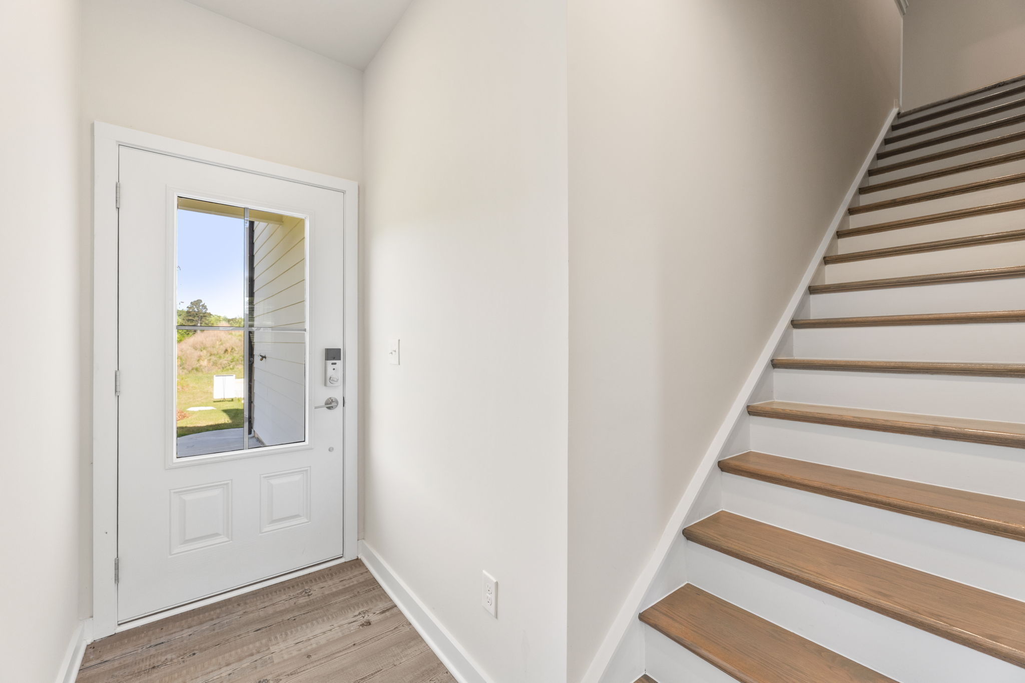 A staircase leading to a door.