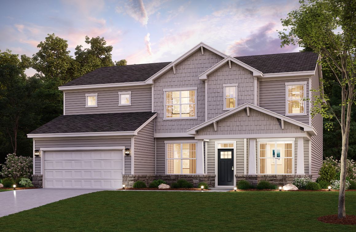 A house with a large front yard.