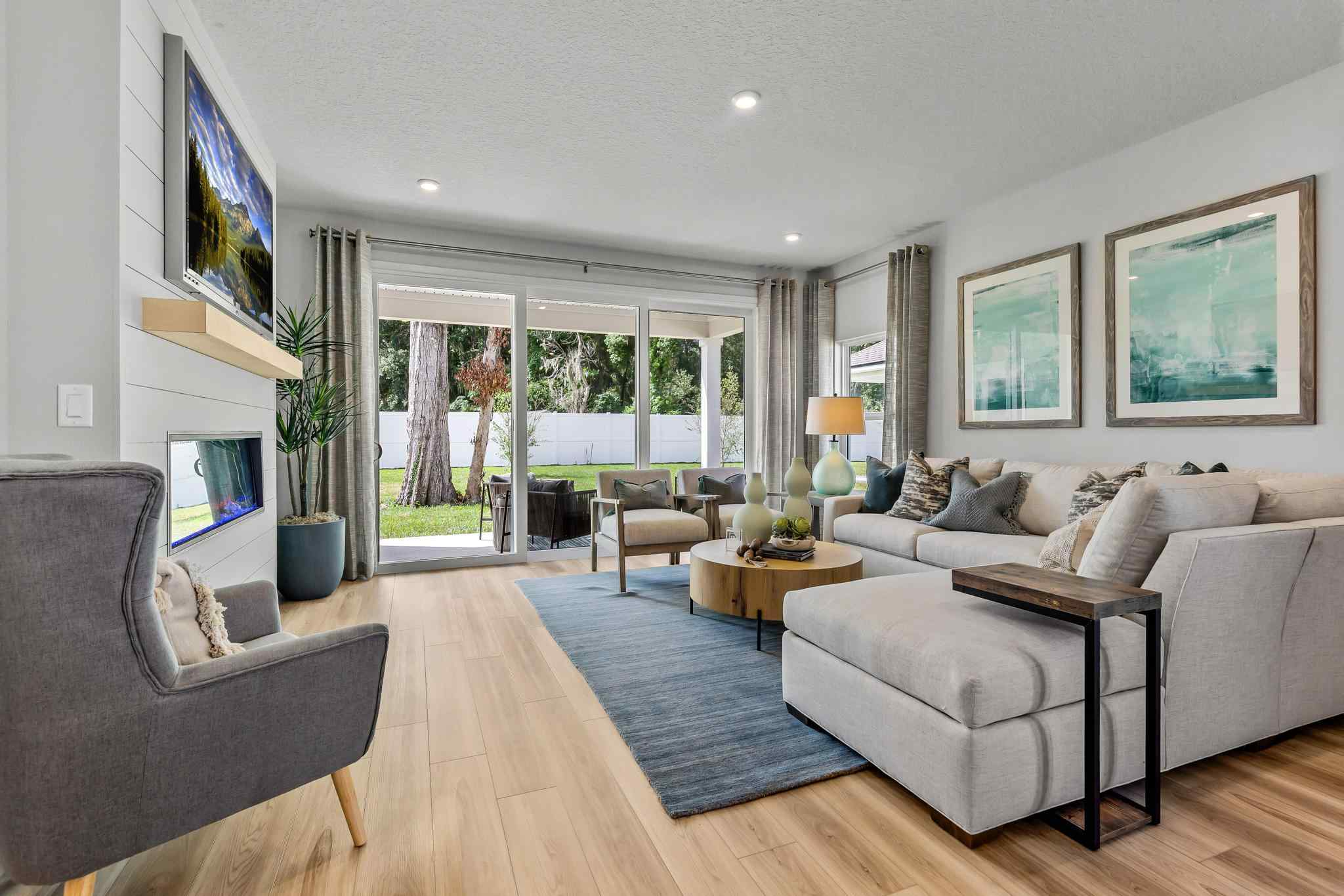 A living room with a large window.