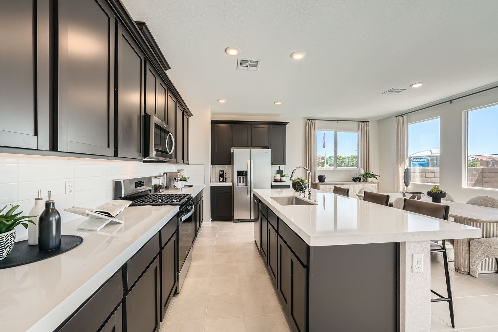 A kitchen with black appliances.