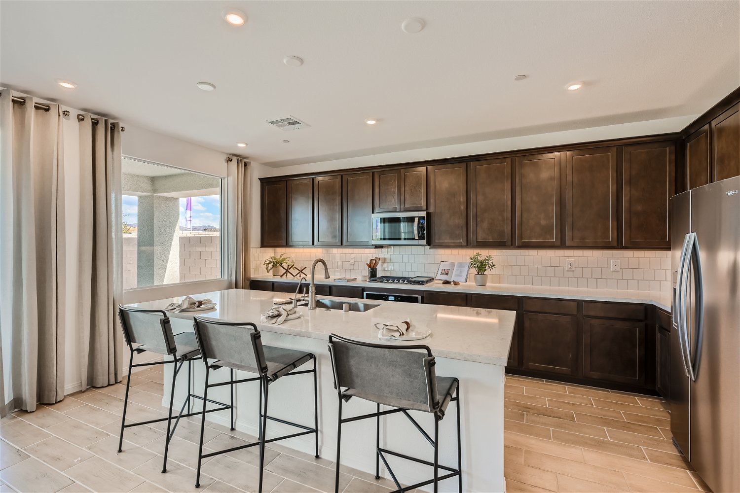 A kitchen with a large island.