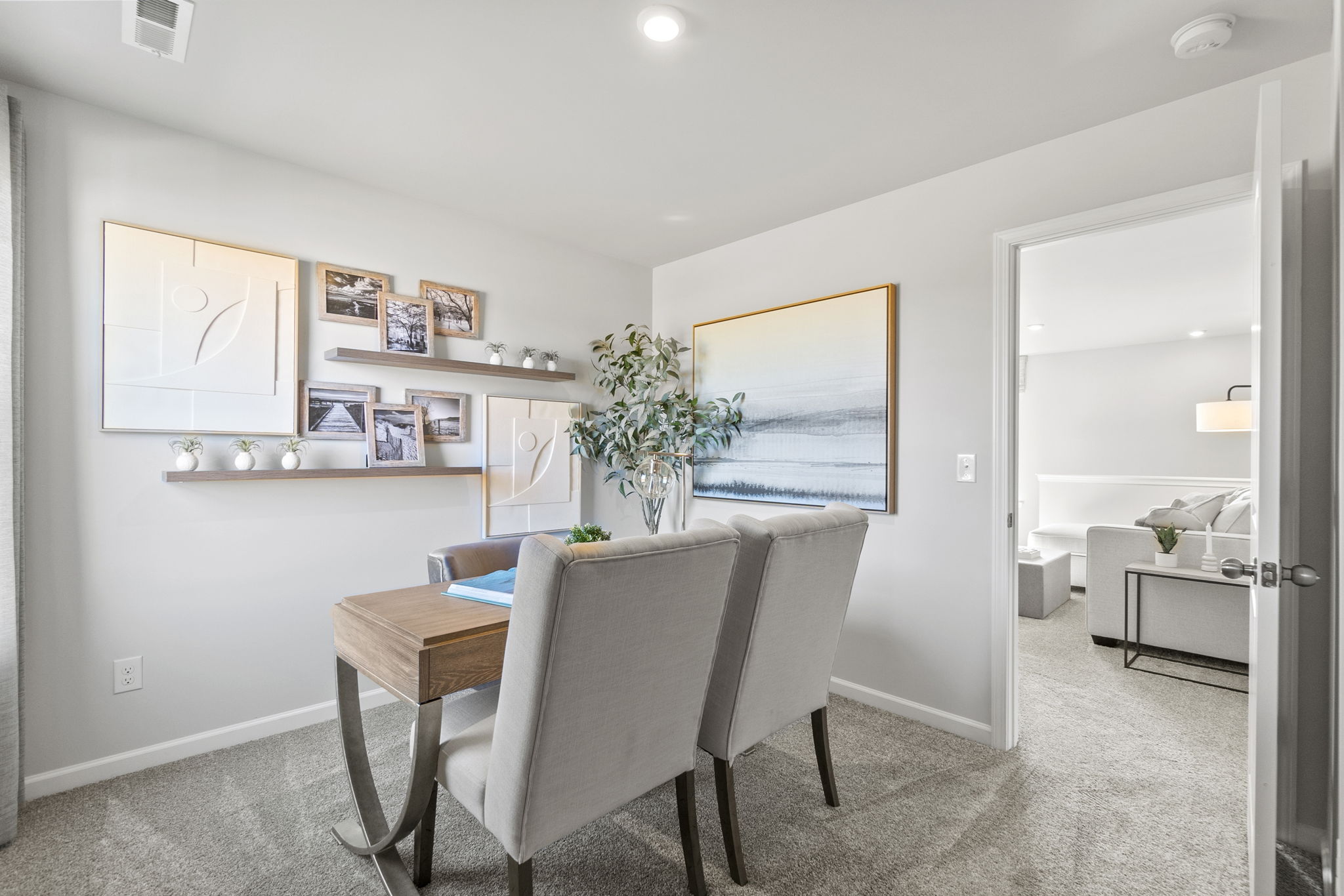 A room with a desk and chair.