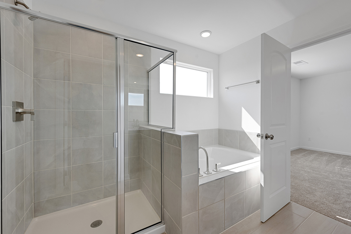 A bathroom with a glass shower.