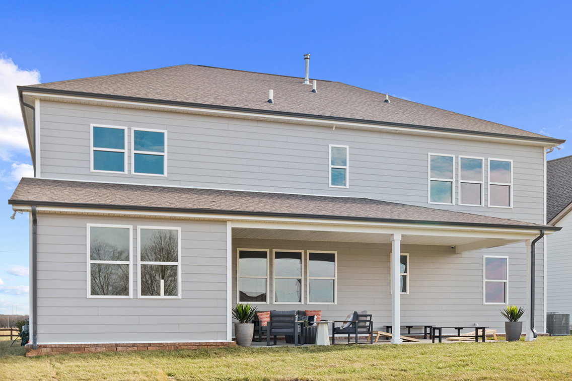 A house with a large front yard.