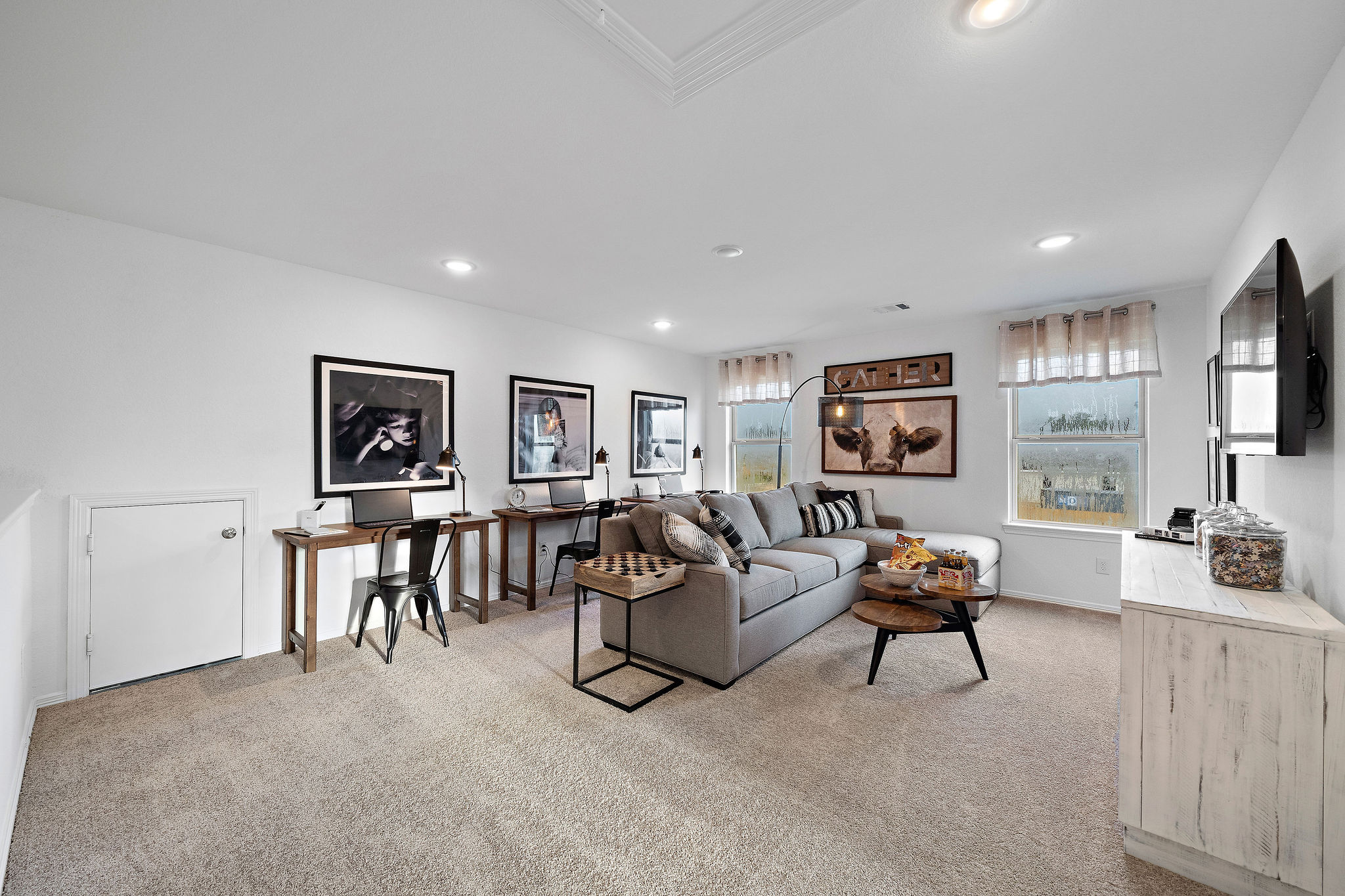 A living room with a couch and a table.