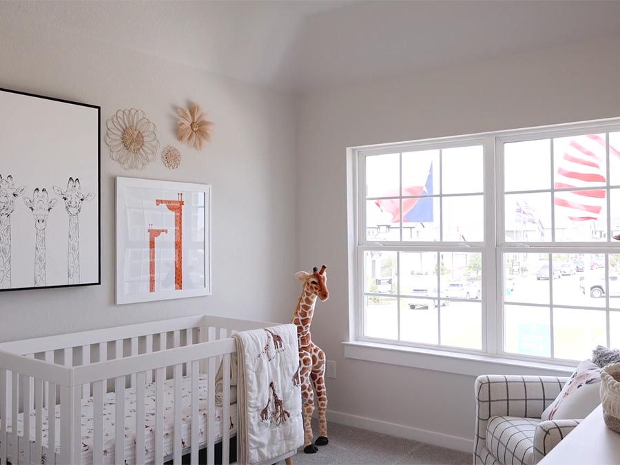 A baby crib in a room.