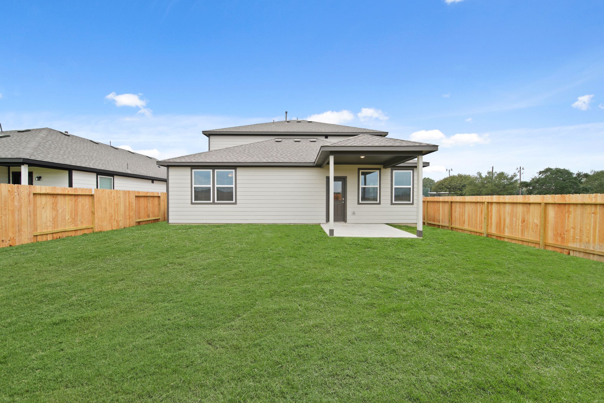 A house with a fence around it.