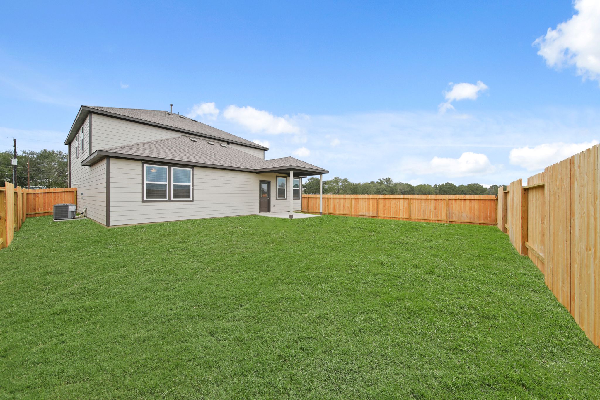 A house with a fence around it.