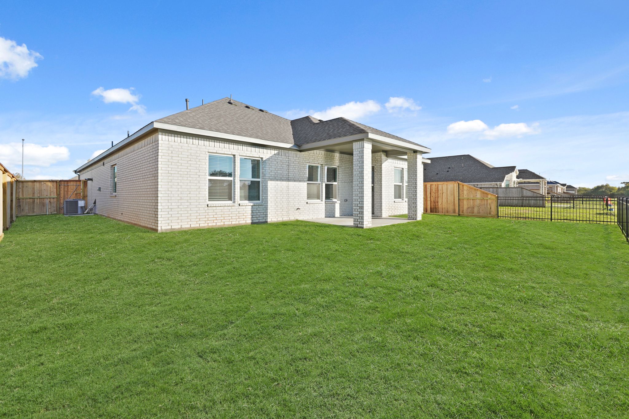 A house with a fence around it.