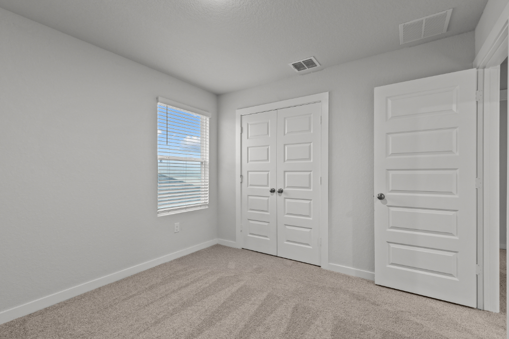 A room with white doors.