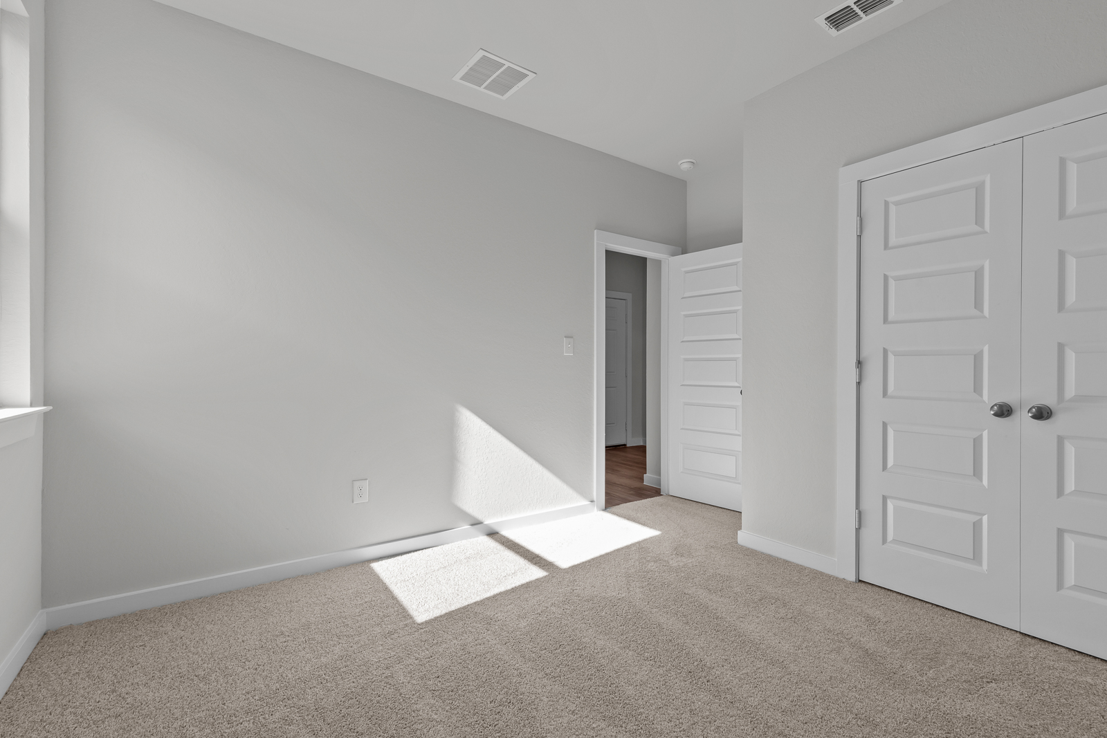 A room with white doors.