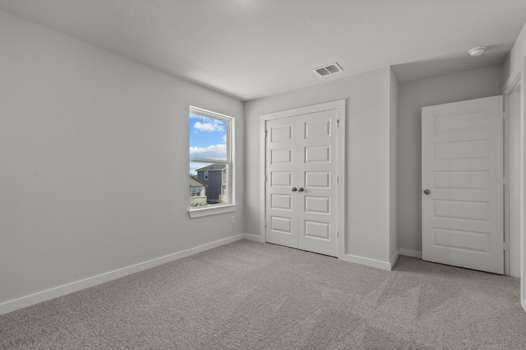 A room with white doors.