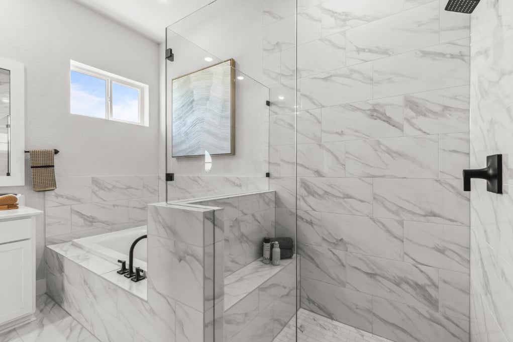 A bathroom with a glass shower.