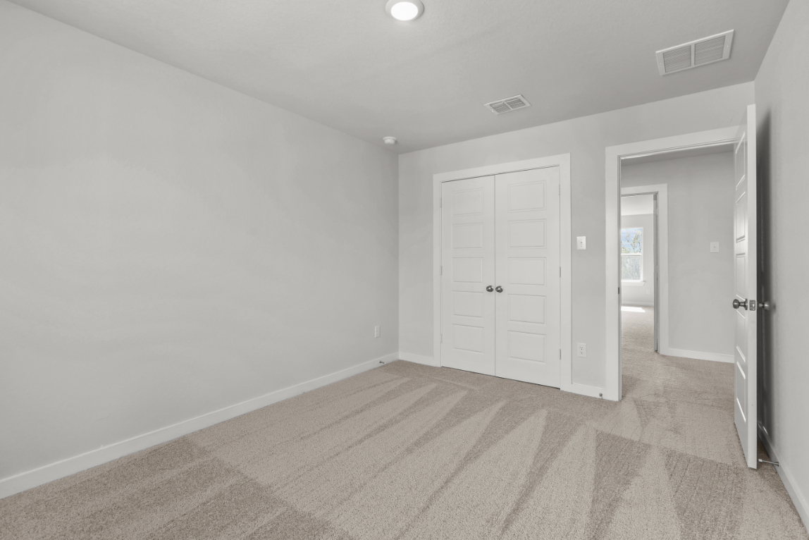 A room with white doors.