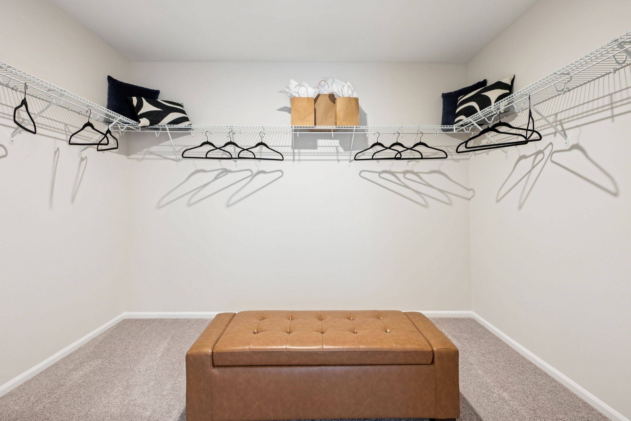 A room with a bed and a table.