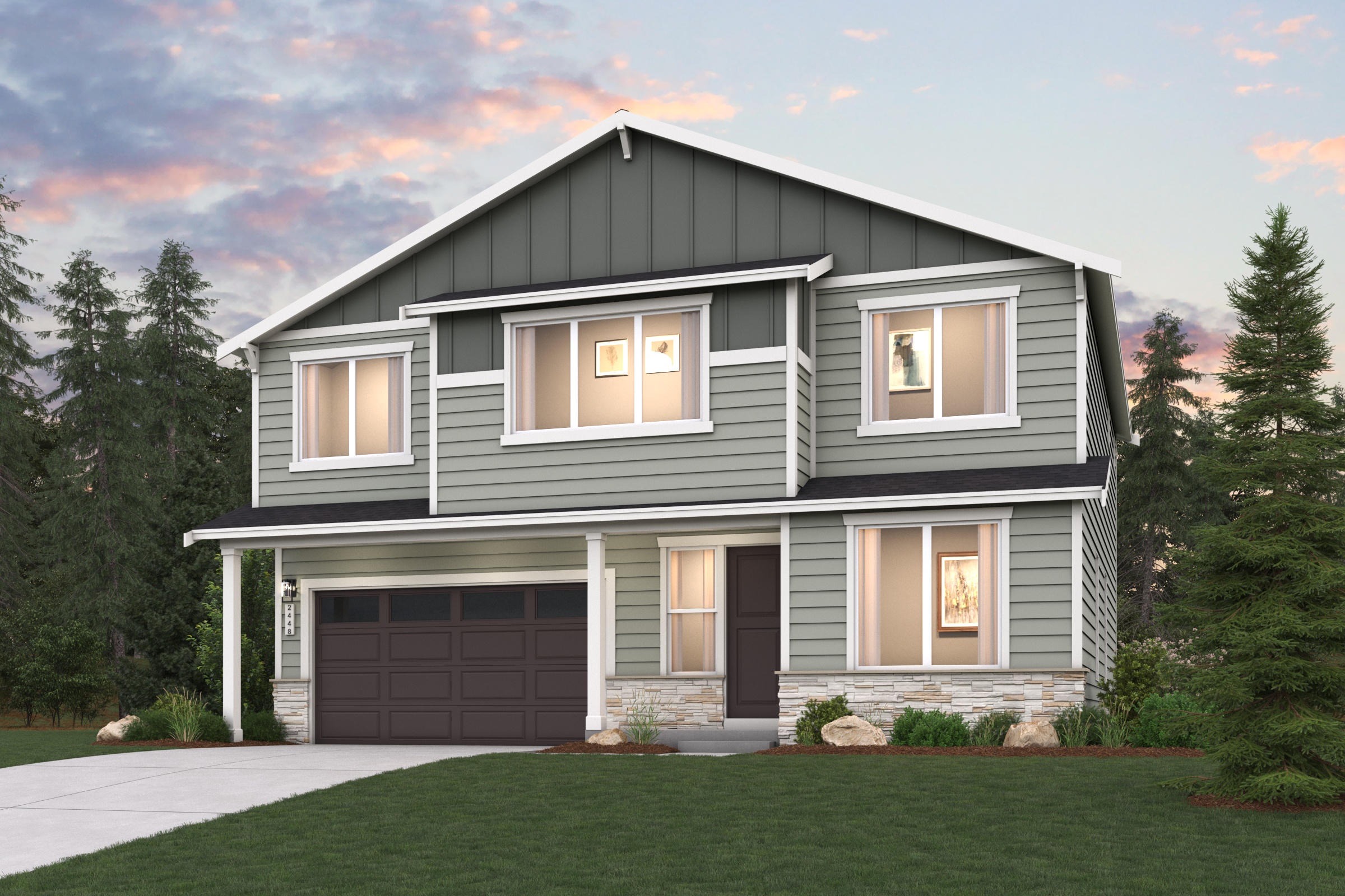 A house with a lawn in front of it.