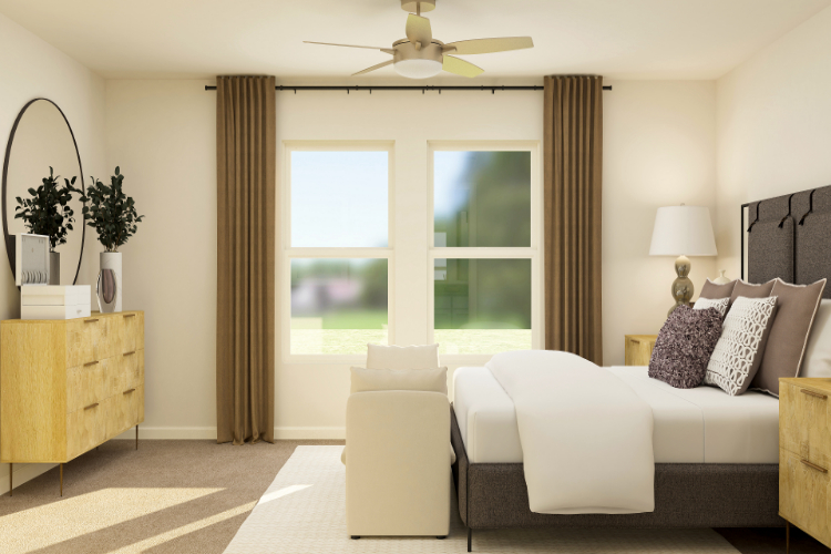 A room with a couch and a window with a view of the city.