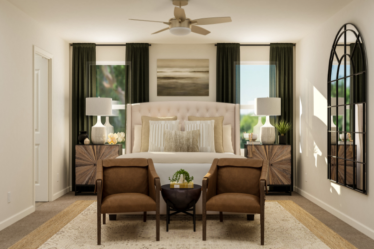 A room with a bed and chairs.